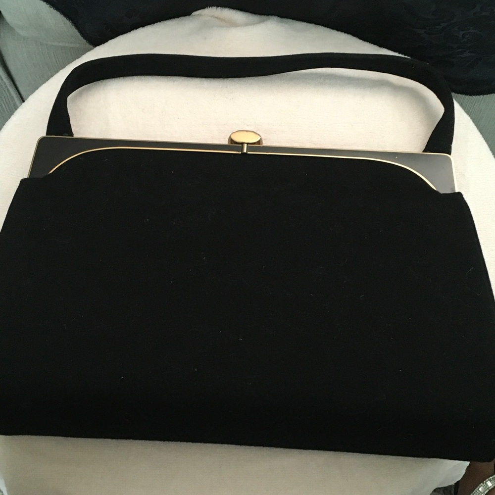 Classic Black Velvet Evening handbag with Gold Accent with fabric lining.